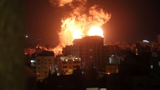 Cover images: Explosions following Israeli air strikes in Gaza city (Picture: Yasser Qudih/Xinhua/Alamy Live News).