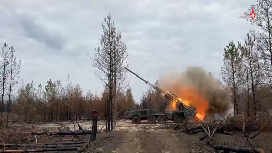 A Russian rocket artillery battery opens fire