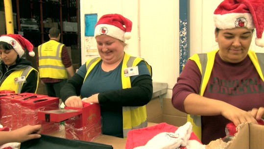 Packers prepare Christmas boxes for charity UK4U