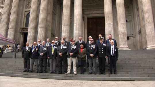 Falklands veterans stand on the steps outside St Paul's Cathedral for an anniversary service.