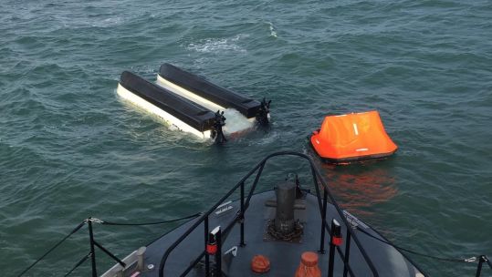 Father and son rescued off three miles off Portland Bill on the Dorset coast as fishing boat capsized 201020 CREDIT Andy Sargent of Coxswain Weymouth RNLI .jpg