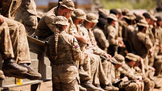 Female soldiers from 1st Battalion The Royal Welsh sit on deployable bridging during a drill on the Drawsko Pomorskie Training Area in Poland on Ex Steadfast Defender 090125 CREDIT MOD