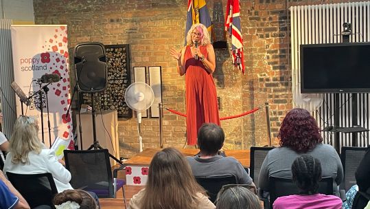 Female veteran performing at Edinburgh Fringe festival as part of Royal British Legion's Recover Through Comedy programme 160823 CREDIT BFBS