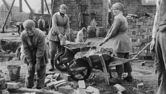 Female bricklayers on building site during WWI
