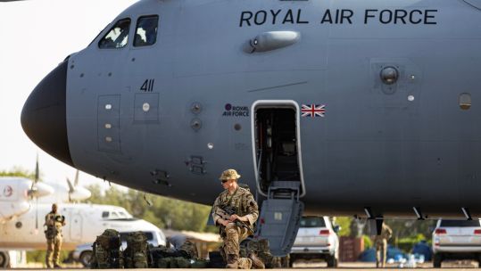 Final days of evacuations from Wadi Seidna Air Base, Sudan, evacuees and military personnel waiting to board an RAF aircraft 29042023 CREDIT MOD Crown Copy
