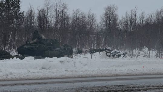 Finnish Leopard 2 tanks and Swedish CV-90 infantry fighting vehicles crossed from Finland into Norway at Kivilompolo CREDIT NATO TV