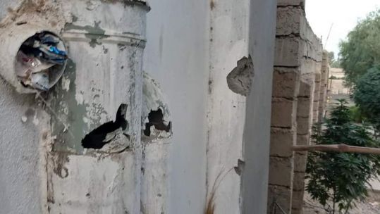 Firearm damage seen in Lashkar Gah seen amid sustained attack from the Taliban.