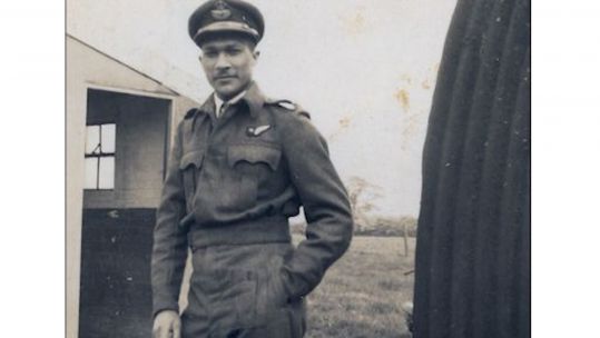 Flight Lieutenant John Blair posing with RAF uniform during WW2