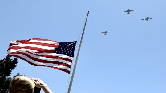 Cover image: World War Two aircraft conduct a flypast over San Francisco National Cemetery (Picture: PA).