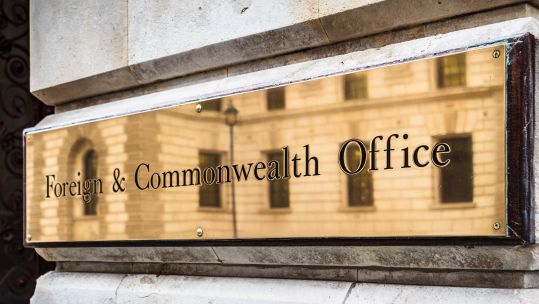 Foreign and Commonwealth Office FCO Whitehall London - sign at the entrance to the Foreign Office King Charles Street London