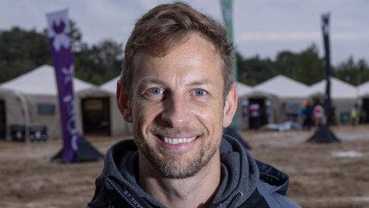 Former F1 World Champion Jenson Button praises the military at the closing race of Extreme E, the sport for purpose electric off-road racing series (Picture: MOD).