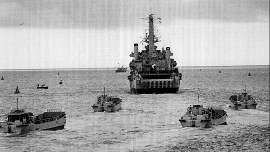 Foxtrot 4 (foreground left) sails with HMS Fearless as she departs Portsmouth for the Falklands in April 