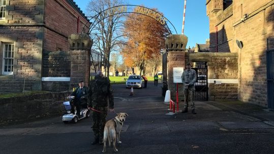 Gordon Macmillan Army Veteran in nuclear warfare suit sets off Cameron Barracks for charity walk 061120 CREDIT Poppyscotland