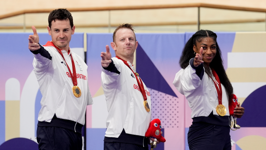 Great Britain's Jaco van Gass, Jason Cundy and Kadeena Cox with the gold medals after the Open C1-5 750m Team Sprint Final at the National Velodrome 010924 CREDIT PA