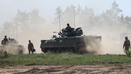 Ground soldier guides Warrior Infantry Fighting Vehicle as part of Steadfast Defender 21052024 CREDIT British Army