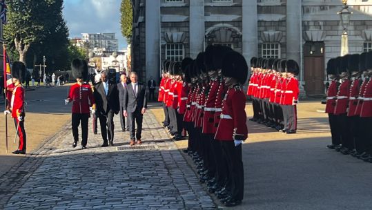 A British Army Guard of Honour in Greenwich welcomed officials from the US and Australia for the first UK-hosted AUKUS meeting