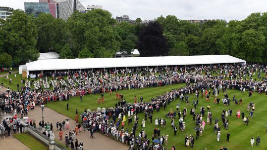 Guests during a Royal Garden Party at Buckingham Palace in London 290519 CREDIT PA.