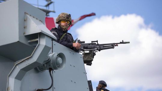 Gunner on HMS Lancaster bridge wing during weapons trials 100620 CREDIT Royal Navy