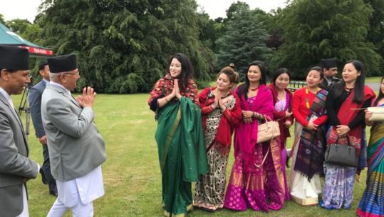 KP Sharma Oli met military personnel and their partners.
