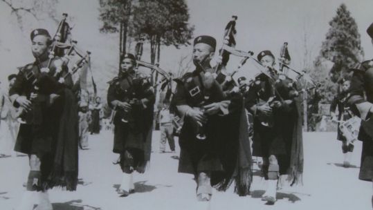 Gurkhas with bagpipes, Between Two Worlds Exhibition, 130819 CREDIT BFBS