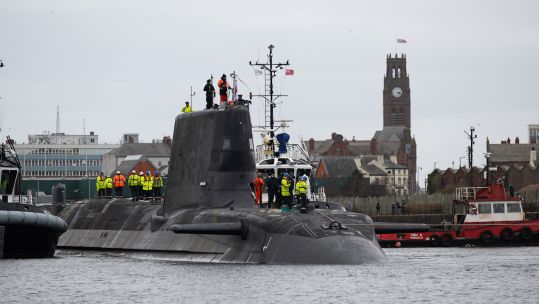HMS Anson leaving BAE Systems Barrow in Furness fifth Astute-Class attack submarine begins sea trials 