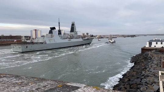 HMS Defender arrives in Portsmouth after Carrier Strike deployment in December.