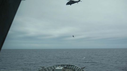HMS Enterprise Evacuate Ill Sailor