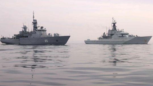 HMS Mersey, right, joins a JEF exercise in the Baltic
