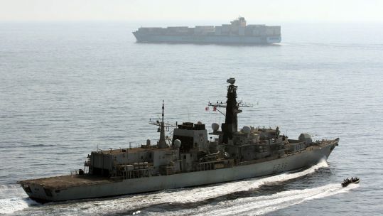 HMS Montrose sails with merchant company in the southern Gulf (Picture: Royal Navy).
