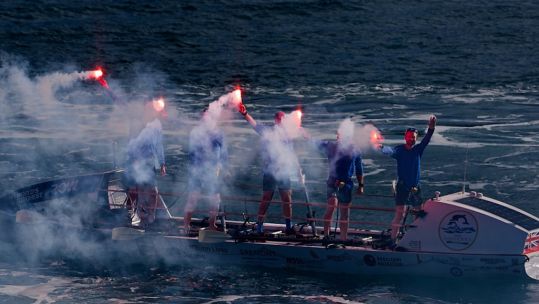 HMS Oardacious crew of Rob Clarke, Daniel Seager, Mike Forrester, lan Allen and Matthew Main were the first team to cross the finishing line in Nelson's Dockyard (Picture: Alligin UK).