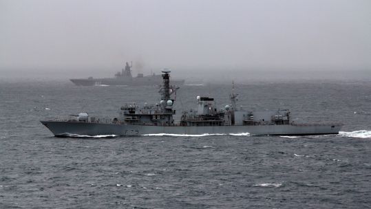 HMS Portland in the foreground and the Russian frigate in the background (Picture: Royal Navy).