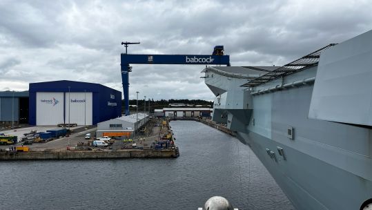 HMS Prince of Wales arriving at drydock in Rosyth