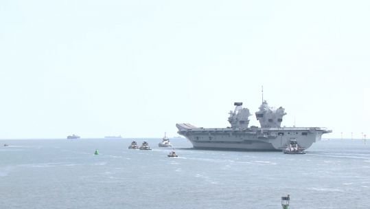 HMS Prince of Wales at sea at portsmouth naval base 300421 CREDIT BFBS