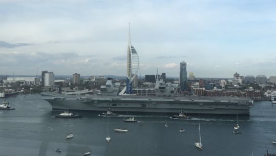 HMS Queen Elizabeth arrived in Portsmouth on Saturday evening after it set sail from Rosyth where it was undergoing maintenance work (Picture: Dave Swateridge/Twitter).