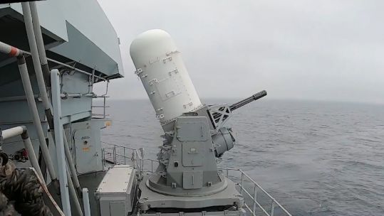 HMS Queen Elizabeth firing the Phalanx weapon system to mark 67 years since The Queen's coronation (Picture: @HMSQNLZ / Twitter).