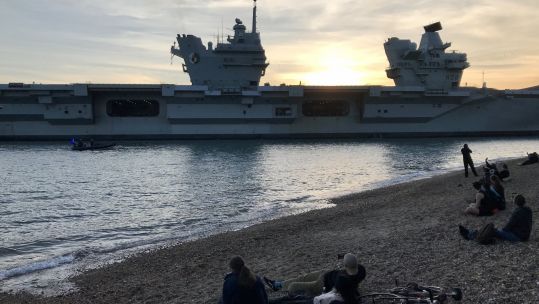 Cover image: HMS Queen Elizabeth arrives in Portsmouth (Picture: HMNB Portsmouth/Twitter).