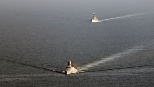 HMS Somerset follows close behind a Russian warship in the English Channel