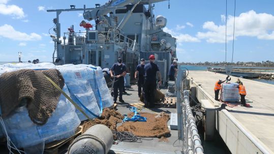 HMS Spey delivers aid to Tonga after Tsunami