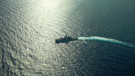 HMS Trent seen from the ship's Puma drone off West Africa