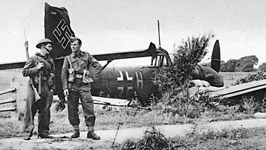 Despite the Luftwaffe's image of invincibility, events turned out otherwise as proven by these Home Guard soldiers guarding the wreckage of a downed Junkers Ju 87B Stuka