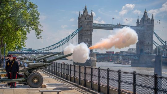 Honourable Artillery Company Army troops perform gun salute for Queen's coronation anniversary at Tower of London