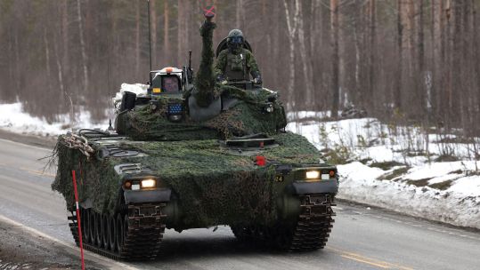 Swedish Army soldier driving a military vehicle during Exercise Cold Response in Norway
