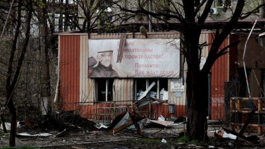 The entrance of the Illich Steel and Iron Works damaged during Ukraine-Russia conflict in the southern port city of Mariupol (Picture: REUTERS/Alexander Ormochenko/Alamy Stock Photo).