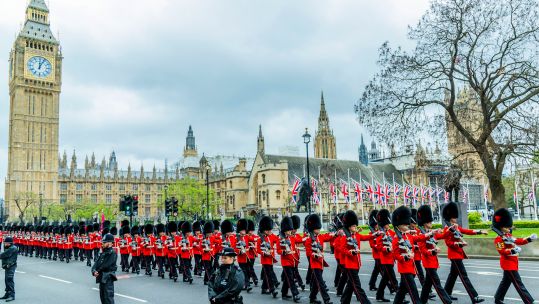 The band and an honour guard from the Coldstream Guards at the State Opening of Parliament (Picture: Guy Bell/Alamy Live News).