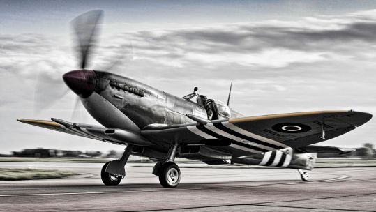 Image ID 45157814 A newly painted BBMF Spitfire at RAF Coningsby its maiden flight in specially painted D-Day Invasion Stripes 2013 CREDIT Crown Copyright