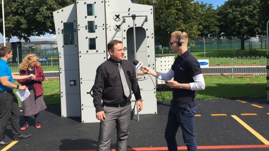 Adam Powney interviewing General Manager, Marc Farrance on the playground