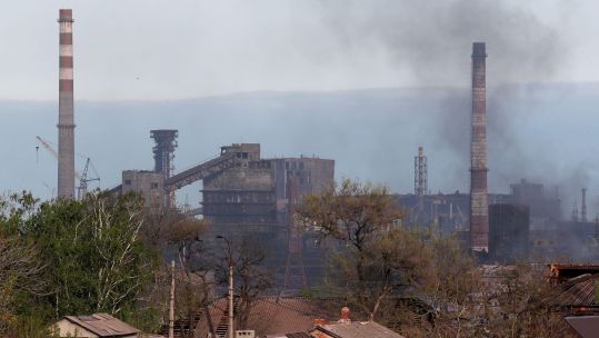 Image ID 2J6R5KK Smoke rises above a plant of Azovstal Iron and Steel Works in the southern port city of Mariupol 03052022 CREDIT REUTERS,Alamy Stock Photo.jpg