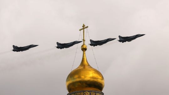 Russian MiG-31 fighter jets fly in formation during rehearsal flypast ahead of military parade