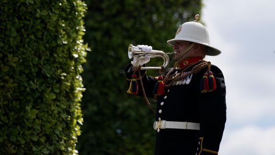 Image ID 2JCMC4T The Last Post is played by Bugler Cpl David Nevatte, during Falkland conflict service at the National Memorial Arboretum 14062022 CREDIT PA, Alamy Stock Photo.jpg
