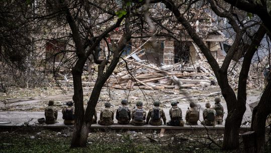 Image ID 2JJ4G36 Ukrainian soldiers sitting at the shelling scene of a destroyed school in Kramatorsk 21072022 CREDIT Alex Chan Tsz Yuk,SOPA Images,Sipa USA, Alamy Stock Photo.jpg
